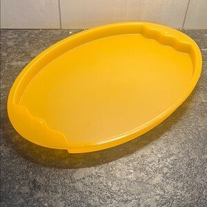 Tupperware Yellow Impressions Oval Serving Tray. Looks to be new 17.5”
